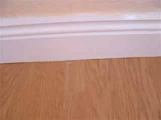 laminate under skirting board