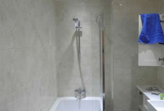 bathroom tiled with ceramic tiles